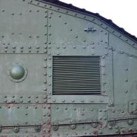 Texture of tank side wall, made of metal and reinforced with a multitude of bolts and rivets photo