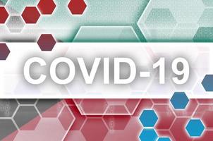 Kuwait flag and futuristic digital abstract composition with Covid-19 inscription. Coronavirus outbreak concept photo