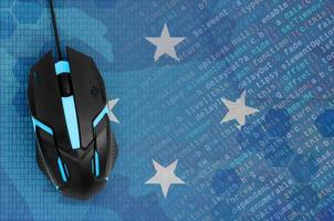 Micronesia flag  and computer mouse. Digital threat, illegal actions on the Internet photo