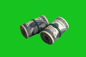 Bundle of US dollar bills isolated on chroma keyer green. Pack of american money with high resolution on perfect green mask photo