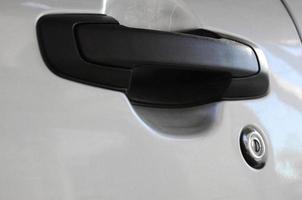 Close up black car door handle. Car equipment photo