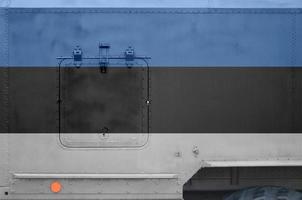 Estonia flag depicted on side part of military armored truck closeup. Army forces conceptual background photo