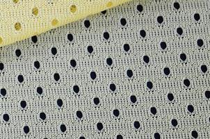 Yellow mesh sport wear fabric textile background pattern photo