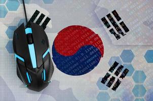 South Korea flag  and computer mouse. Digital threat, illegal actions on the Internet photo