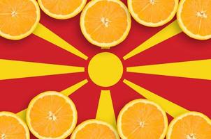 Macedonia flag  in citrus fruit slices horizontal frame photo