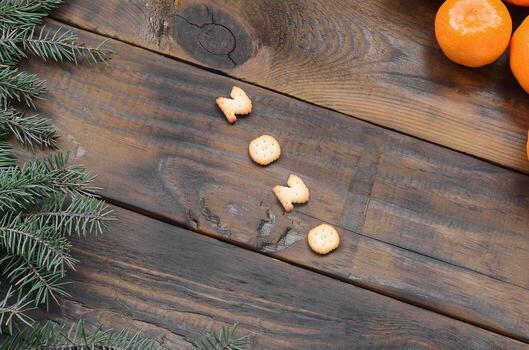 Tangerines, cracker 2020 digits and fir branches with copy space photo