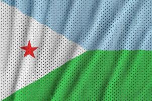 Djibouti flag printed on a polyester nylon sportswear mesh fabri photo