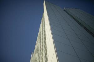 Tall building. Lots of floors. Art Nouveau architecture. Small windows. photo