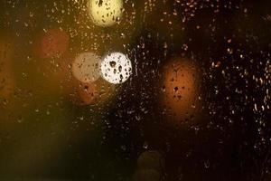Water on glass. Raindrops on window. Background window. photo