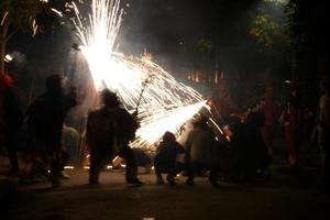 Abstract photo of devils and fireworks parties.