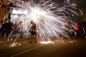 Abstract photo of devils and fireworks parties.