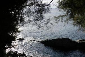 Mediterranean coastline with rocks in the catalan region, Spain photo