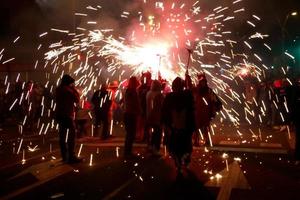 Abstract photo of devils and fireworks parties.