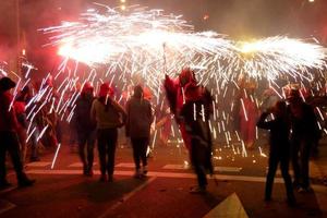 Abstract photo of devils and fireworks parties.