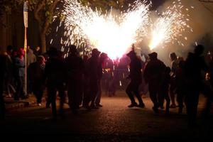 Abstract photo of devils and fireworks parties.