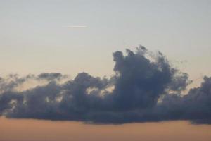 Clouds in the sky in late summer photo