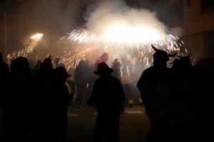 Abstract photo of devils and fireworks parties.