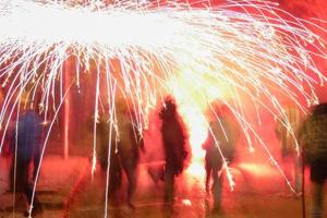 Abstract photo of devils and fireworks parties.