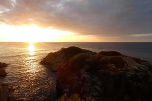 Mediterranean coastline with rocks in the catalan region, Spain photo