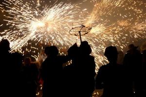 Abstract photo of devils and fireworks parties.