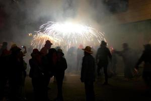 Abstract photo of devils and fireworks parties.