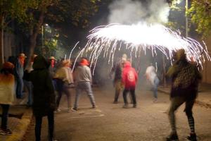 Abstract photo of devils and fireworks parties.