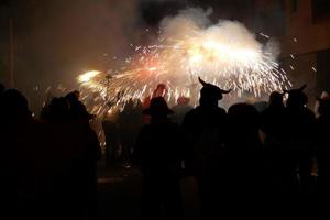 Abstract photo of devils and fireworks parties.