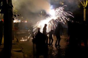 Abstract photo of devils and fireworks parties.