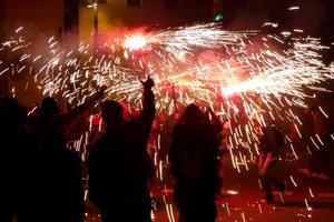 Abstract photo of devils and fireworks parties.