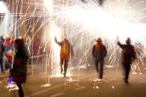 Abstract photo of devils and fireworks parties.