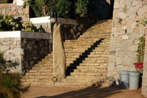 Menir on the coastal path of the Costa brava in the town of S'Agaro photo