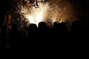 Abstract photo of devils and fireworks parties.