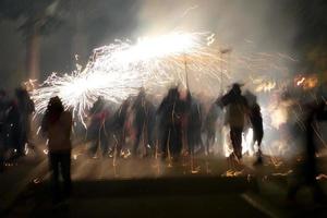 Abstract photo of devils and fireworks parties.