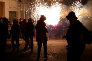 Abstract photo of devils and fireworks parties.