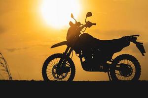 Motocross Kawasaki on the beautiful light mountain, 10 November 2022, Surat Thani, Thailand. photo