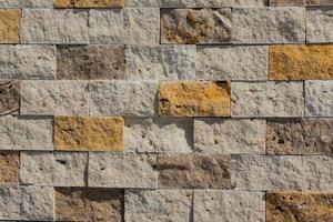 Decorative cubic stone wall background photo
