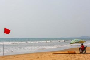 Rescuer of Goa Beach, watching the swimming and bathing in Arambol Goa, India photo
