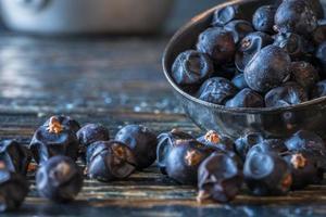 Juniper Berries Spilled from a Teaspoon photo