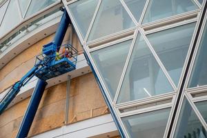 Milan 2022 Worker at work on the lifting platform photo