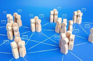 Communicating groups of people are connected by lines. A company with a modified hierarchical system for the distribution of duties and responsibilities. Effective flexible decision making system photo