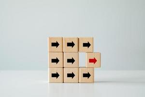 Red arrow leading other arrow. Leadership, Teamwork, Strategy, Planning and difference, Individuality, Unique, difference, Challenge goal and target, Business achievement and objective target. photo