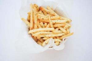 overhead shot of French Fries on white background photo