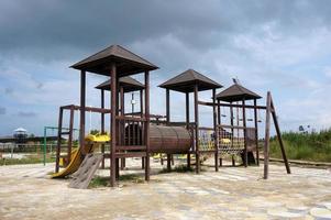 Sangatta, East Kutai, East Kalimantan, Indonesia, 2022 - Playground with wooden equipment for kids photo