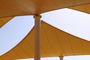 Canopy in the city park to protect from the scorching sun. photo