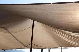 Canopy in the city park to protect from the scorching sun. photo