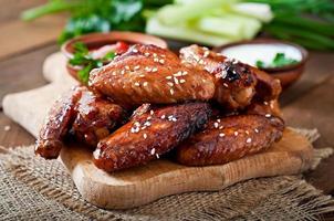 Baked chicken wings with teriyaki sauce photo