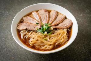 duck noodles with stewed duck soup photo