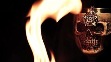 Greece and Babylonia Religion Symbol Pentagram on Skull Head and Fire photo