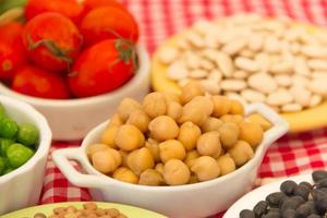 variety of kitchen ingredients with fresh and dried legumes photo