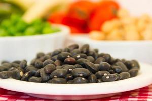 variety of kitchen ingredients with fresh and dried legumes photo